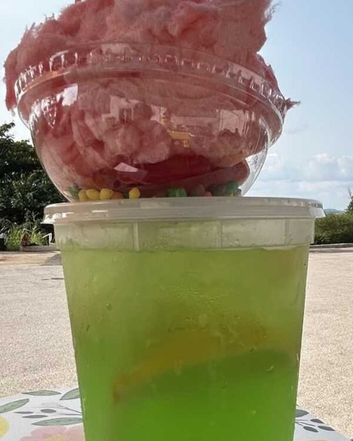 Green apple lemonade with cotton candy topper